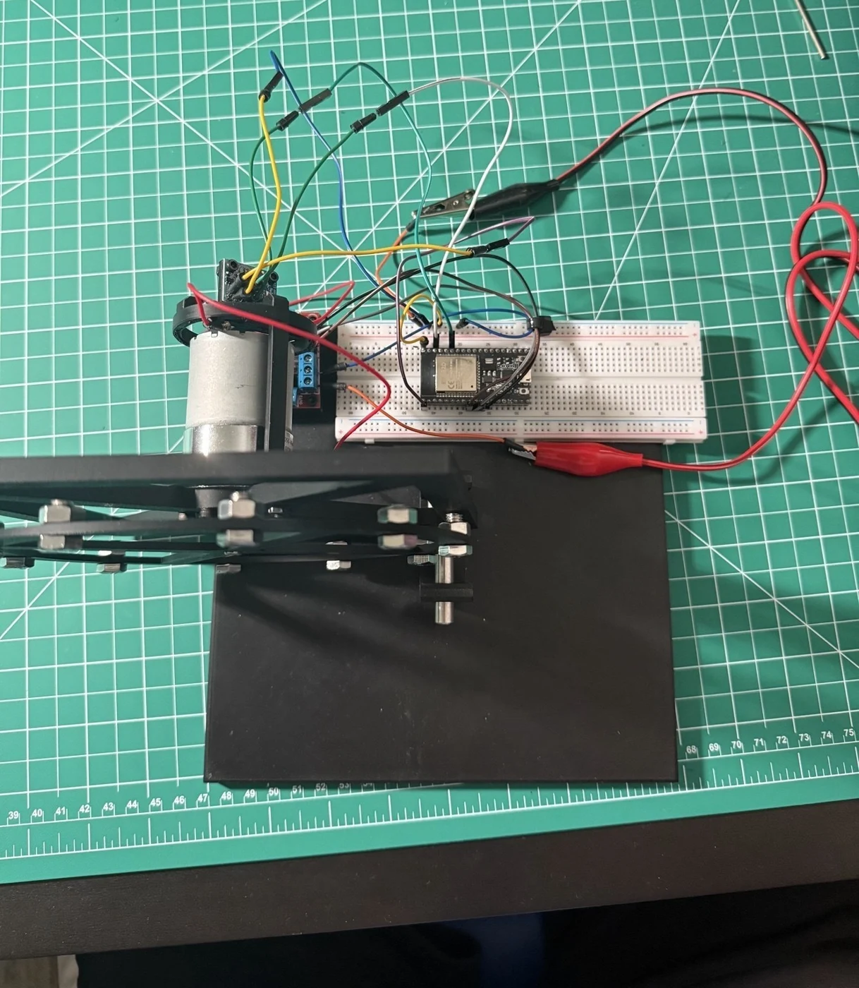 Physical reaction-wheel balancing test platform on a workbench